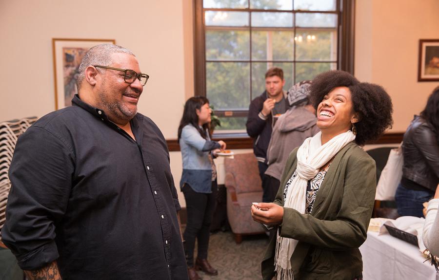 Nigerian-born poet and NYTimes Bestselling author Chris Abani at a reception following his reading at the Fall 2016 Zalaznick Reading Series (ZRS).