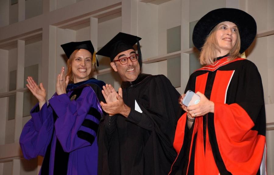 Jenny Mann, J. Robert Lennon, Samantha Zacher applauding graduates