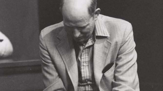 AR Ammons listens to undergraduate student readings at Temple of Zeus, Goldwin Smith Hall