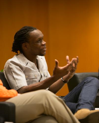 Ishion Hutchinson speaking at a panel event