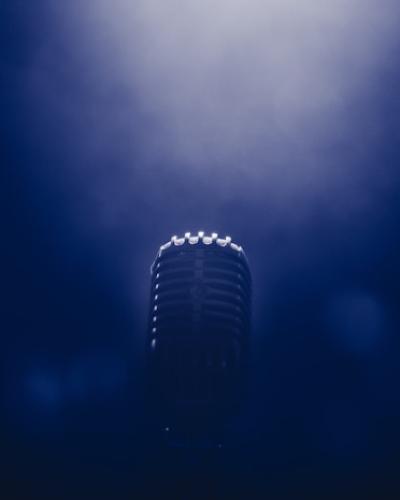 closeup photograph of microphone in dimly lit space